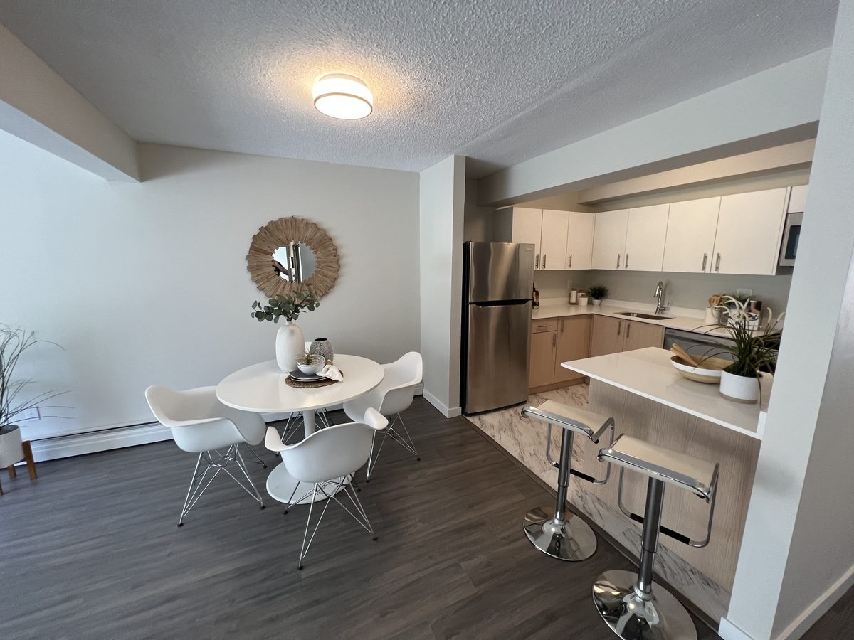 Renovated apartment kitchen and dining area
